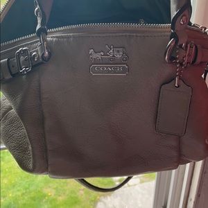 Its a coach shoulder or hand bag used.